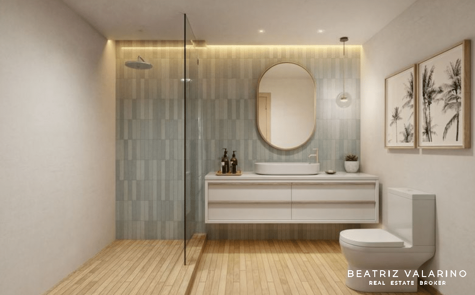 Baño contemporáneo en Parkside Brickell con ducha de vidrio, lavabo y detalles decorativos.