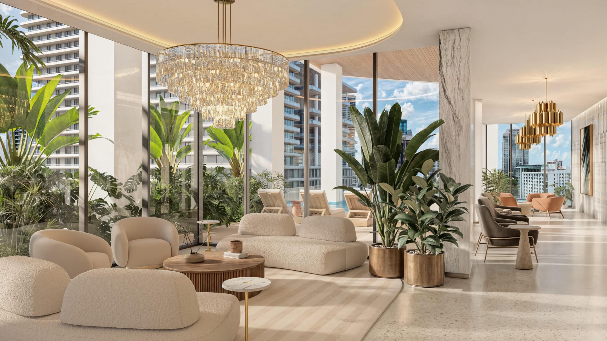 Lounge en Season One Brickell con asientos cómodos, plantas decorativas y ventanales amplios.