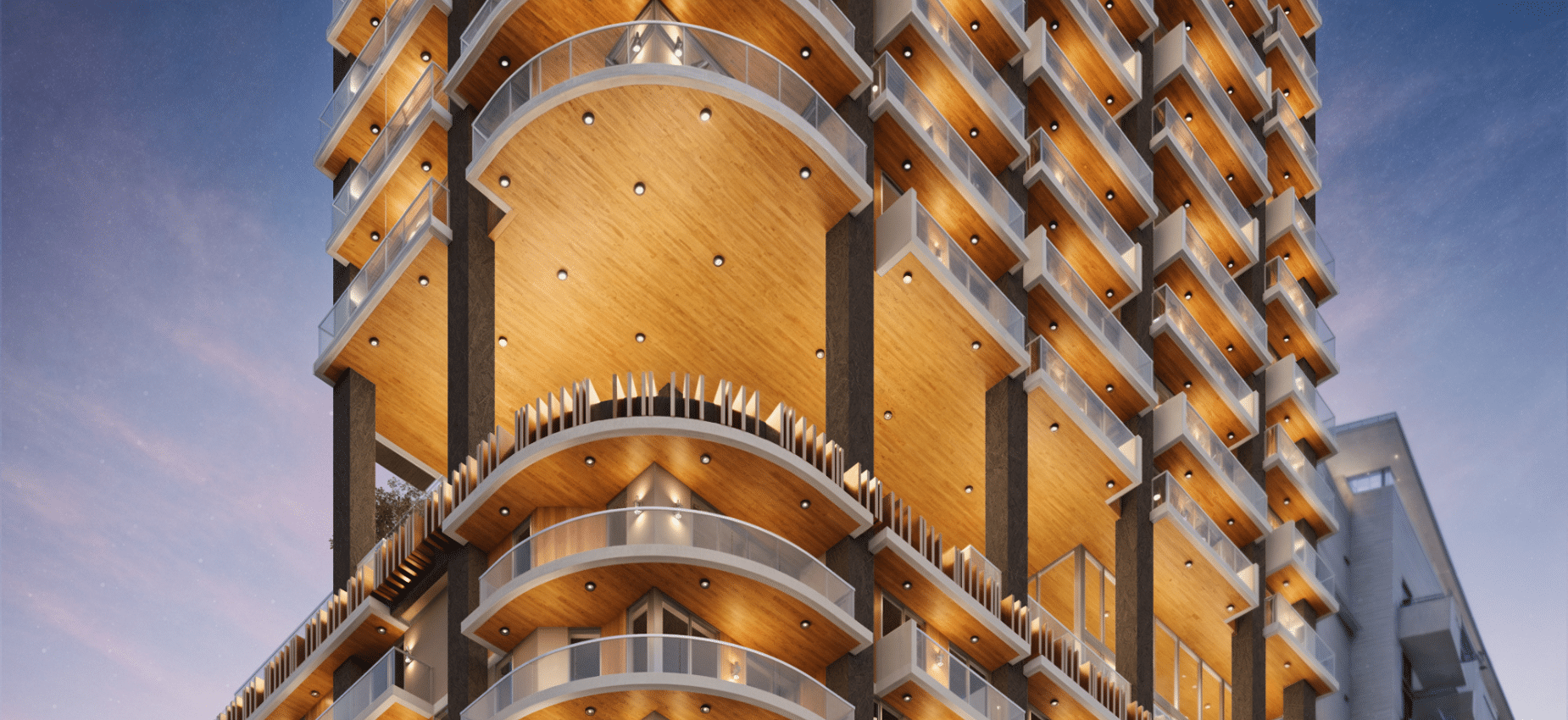 Detalle de la fachada de Season One Brickell con iluminación nocturna y balcones modernos.